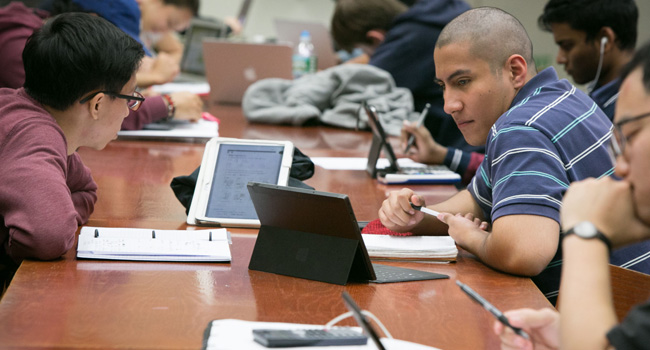 CCNY students in library