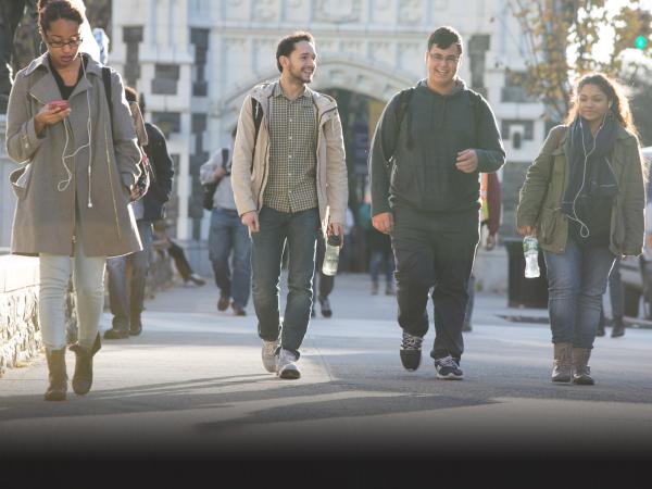 CCNY student walking on campus