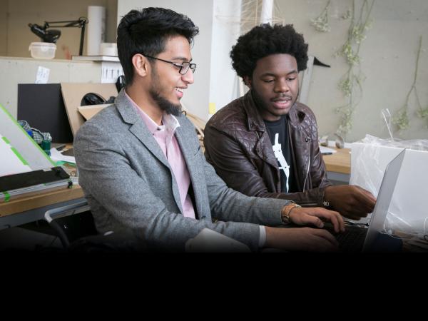 Two CCNY students in classroom 