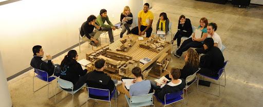 architecture students sitting in a circle and studying