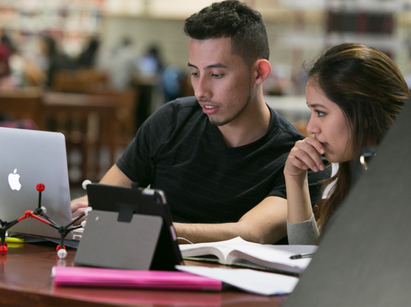 CCNY Students in library 