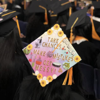 Bio student with graduation cap