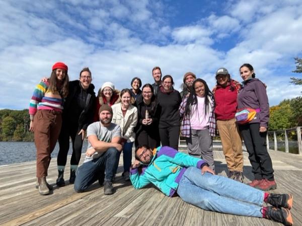 Students standing in front of the ocean