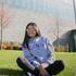 Student sitting on grass 