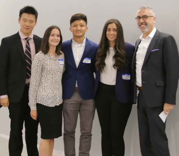 Team MenoPal (from left) Bo Guan, Chaya Edelman, Mican Meneses and Cira Cardaci with fellow CCNY alum and Nestle SHIELD senior medical director and head of medical innovation Dr. Warren Winkelman.