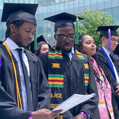 Four students at Commencement 