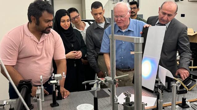 Some members of the UAEREP team on a tour of Professor Robert Alfano's lab. From left: CCNY PhD student Sandra Mamani Reyes; UAEREP's  Alya Al Mazroui and Sufian Farah; Southern Connecticut State University physicist Binlin Wu and Alfano.