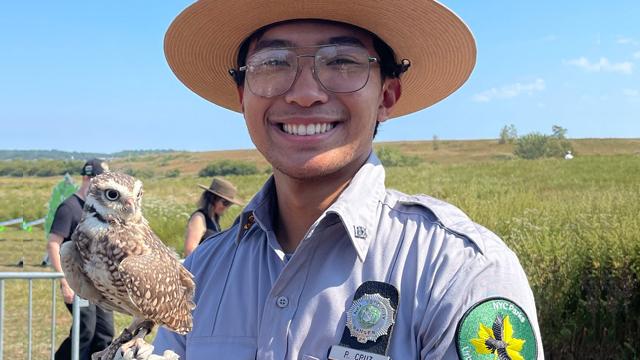 New York City Park Ranger and CCNY Science Education student Rafael Cruz with a friend